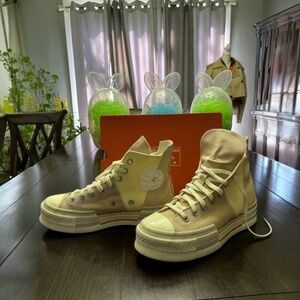 Nearly New. Unisex Converse High-top All Stars with the logo patch on the inside